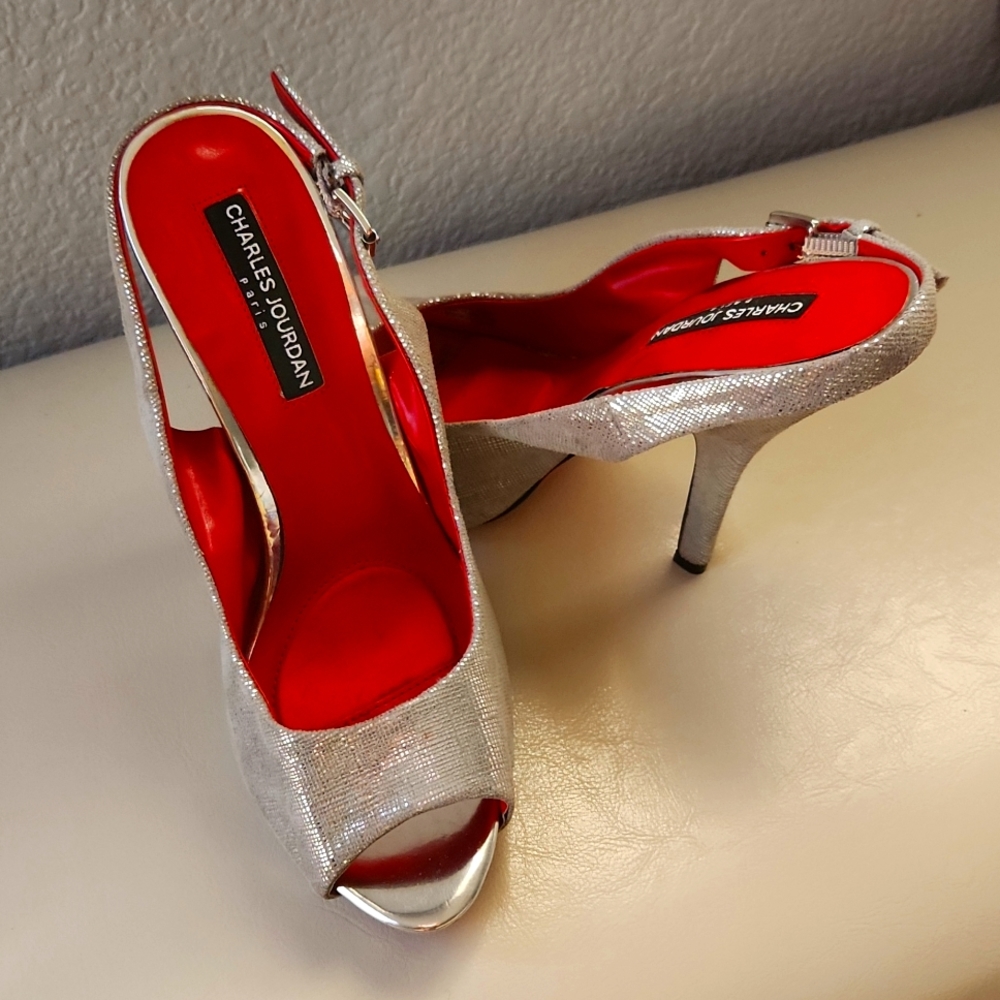 Red bottom Charles Jordan sling backs